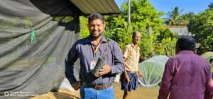 Sameera with our first alternative crop sapling!