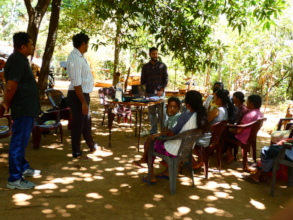 Our team conducting pocket meetings with farmers