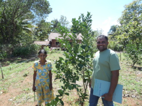 Kumara (team member) and a farmer from our project