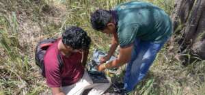 Our team setting up the camera traps.