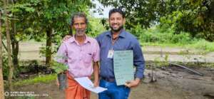 Staff with a farmer