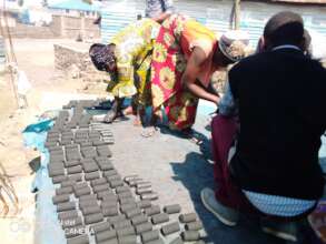 Refugees in the center making charcoal in Goma