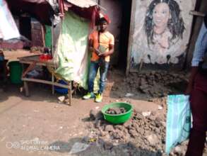 This youngman is already selling the charcoal made