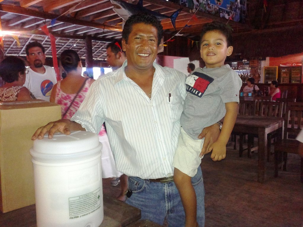 Water Filter being given to a Family