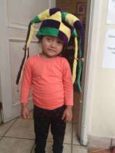 Lupita with her fun hat during playtime