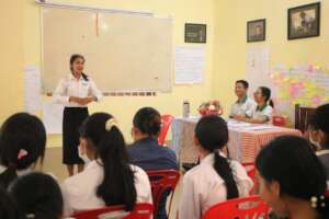 Student participating in the Public Speaking class