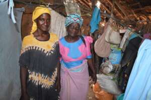 Halima's mum + a founder member inside their house