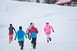 High school students racing in the snow