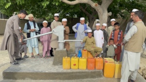 Boys using full-sized well