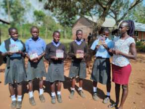Girls with newly received solar lamps