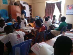 STEM class in Ndhiwa, girls learning about coding.
