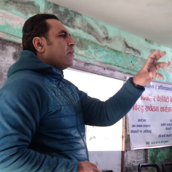 Bishnu teaching about Human Trafficking