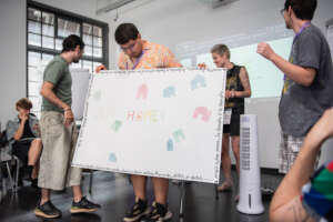 Participants presenting their work to the group