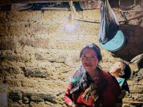 Maria and Son with Solar Lighting