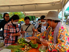 Trainees managing their booth at the weekly Market