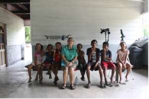 LoraKim Joyner with village children having fun!