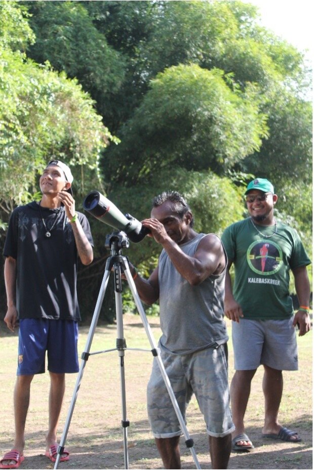 Rangers learning to use a spotting scope