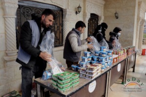 Preparing food baskets in Syria