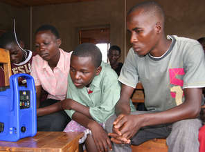 Children in Bugesera listening to the Prime