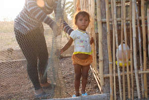 Van's daughter in front of the new chicken coop