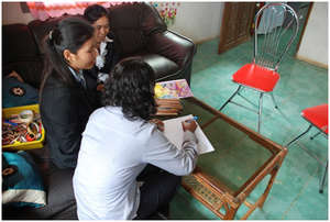 Huon in session with her counselors