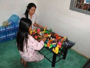 A young sex trafficking victim meets with Sokny