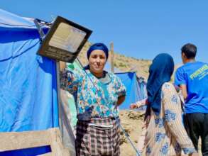 Ms. Ekvira with her tent and solar light