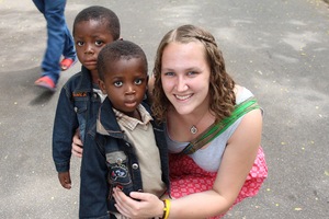 Volunteer, Rebecca, with Edwin and Edward