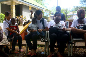 Volunteers with children