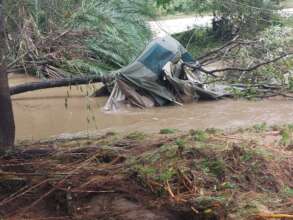 Tent damaged and washed away.