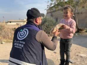 Distributing Fresh Bread to impoverished citizens