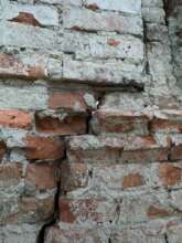 The cracks caused in the outer building shell
