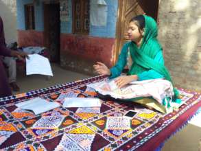 Little women earning via sewing skills