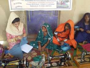 women learning sewing skills