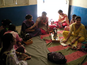 A Group of women learning sewing & cutting