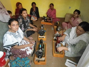 One of training center women busy in sewing
