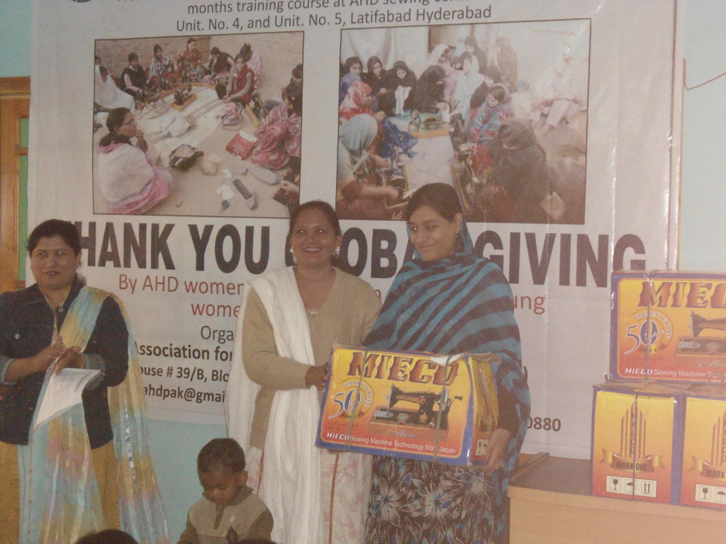 Mrs. Shazia Saleem presenting sewing machine