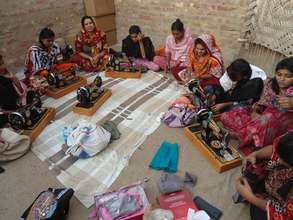 23 young girls learning sewing skills at unit 5