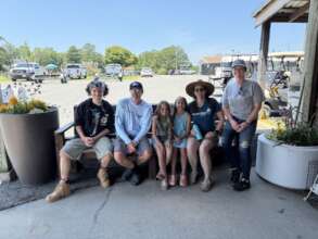 Intern Zack B with group at Potomac River CleanUp