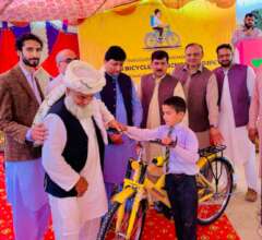 a child receives the bicycle