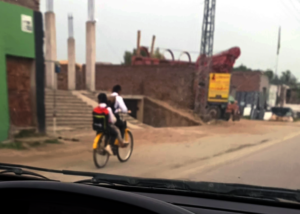 chidren spotted commuting to school on bicycle
