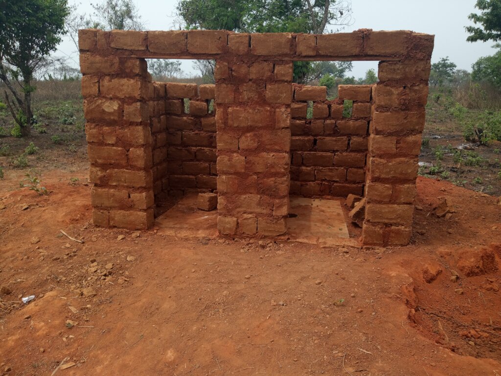 Build 2 Classrooms and Toilets for 700 Pupils.