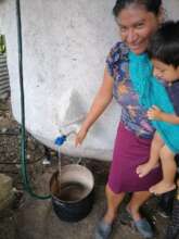 Women using the rain harvest system