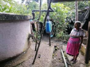Women using the rain harvest system