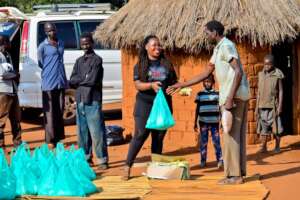 Our COC giving out food to the 42 families
