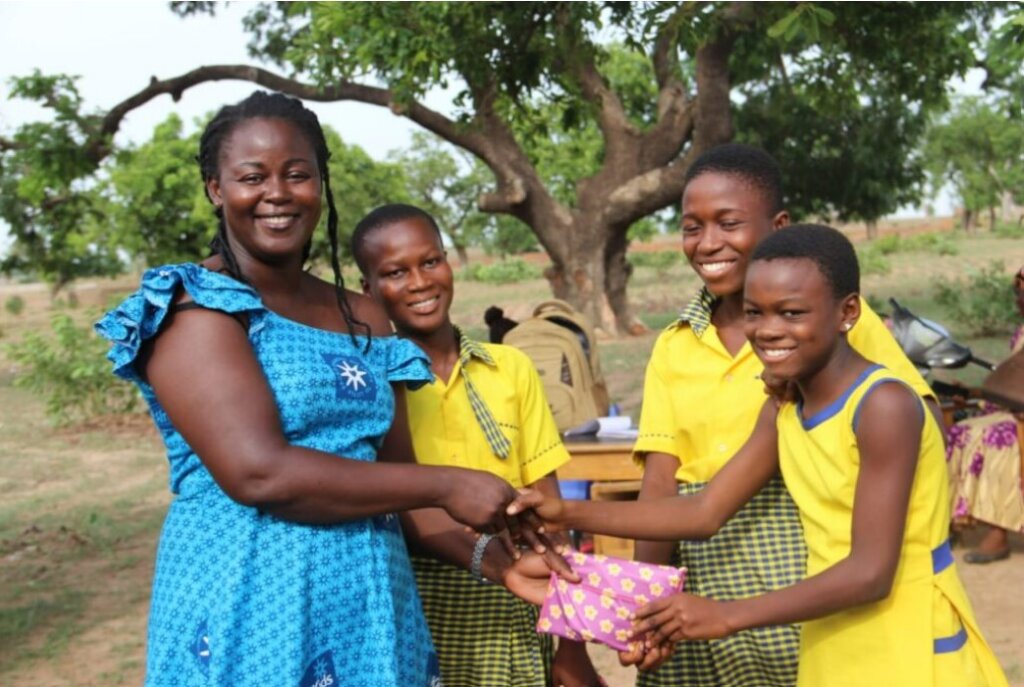 Girls receiving reusable sanitary pads