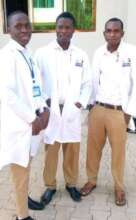 Masumbuko (middle) at Excellent college