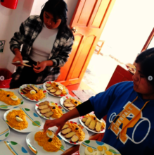 Amantani students prepare Papa a la Huancaina