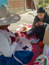 Artisans crocheting fish to be sold in the U.S.