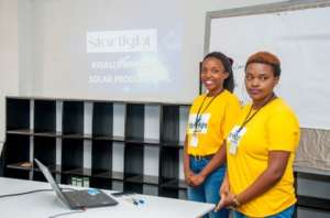 Ariane with Business Partner Pitching to Investors